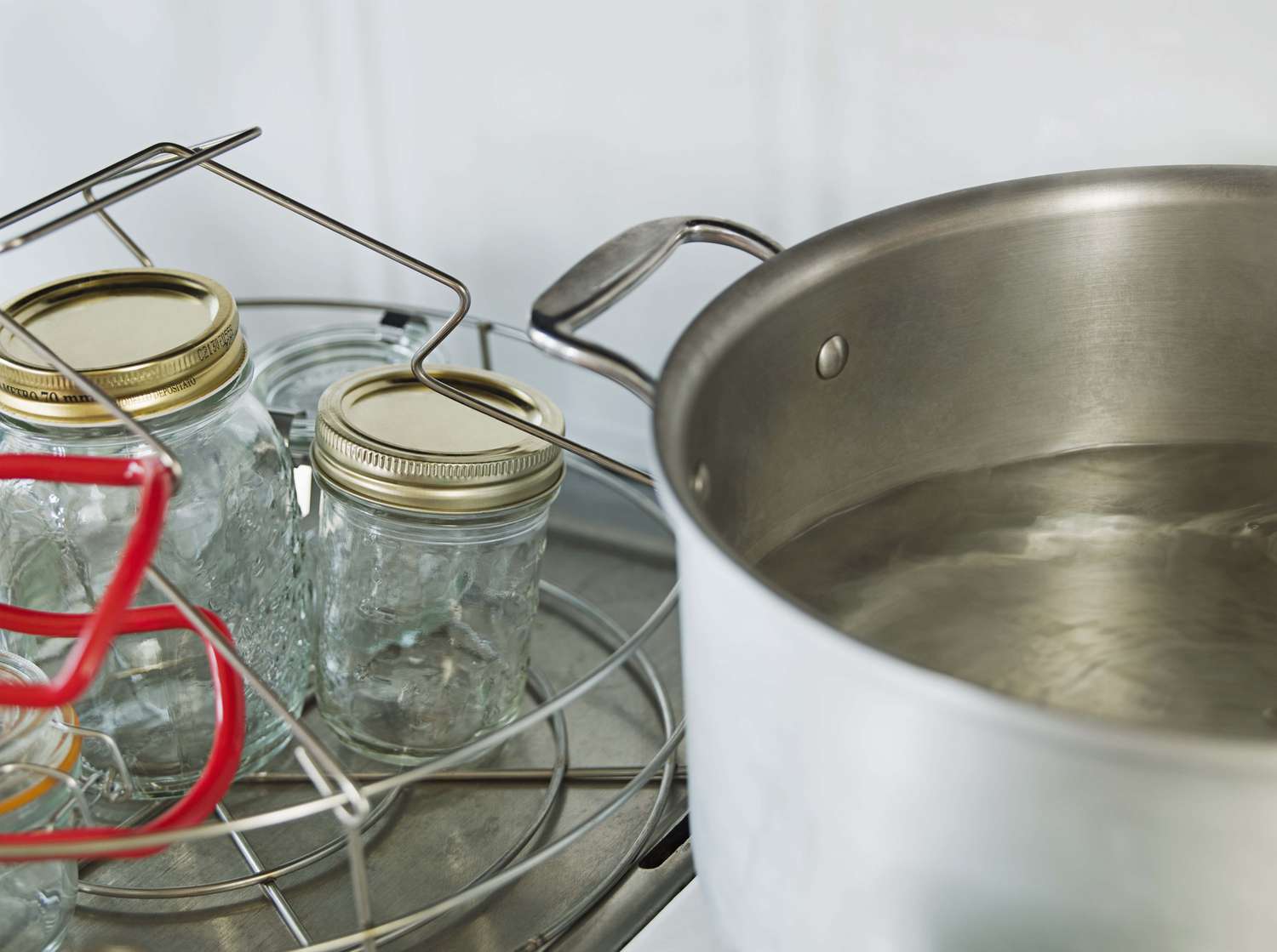 Canning jars placed on their side during the canning process